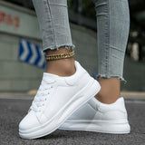 Calindra – Women’s White Lace Up Sneakers
