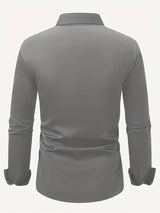 Camicia grigia da uomo a maniche lunghe, vista posteriore. Design elegante e moderno, ideale per abbigliamento casual o formale.