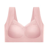 Reggiseno sportivo rosa senza cuciture, design confortevole e traspirante, ideale per attività fisica e supporto quotidiano.