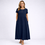 Elvina – Minimalistické krémové maxi šaty s kapsami