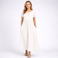 Elvina – Minimalistické krémové maxi šaty s kapsami