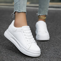 Calindra – Women’s White Lace Up Sneakers