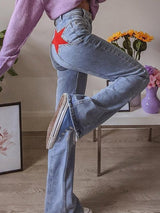 Marelie - High Waist Flared Jeans With Star Appliqué